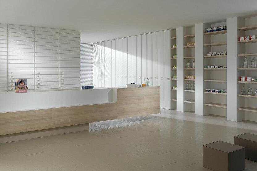 Impressionen einer Apothekeneinrichtung Impressionen einer Apothekeneinrichtung mit hellen Holzmöbeln und geräumigem Regalsystem, sowie aufgeräumten Empfang.